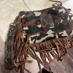 Cowhide/fringe wristlet